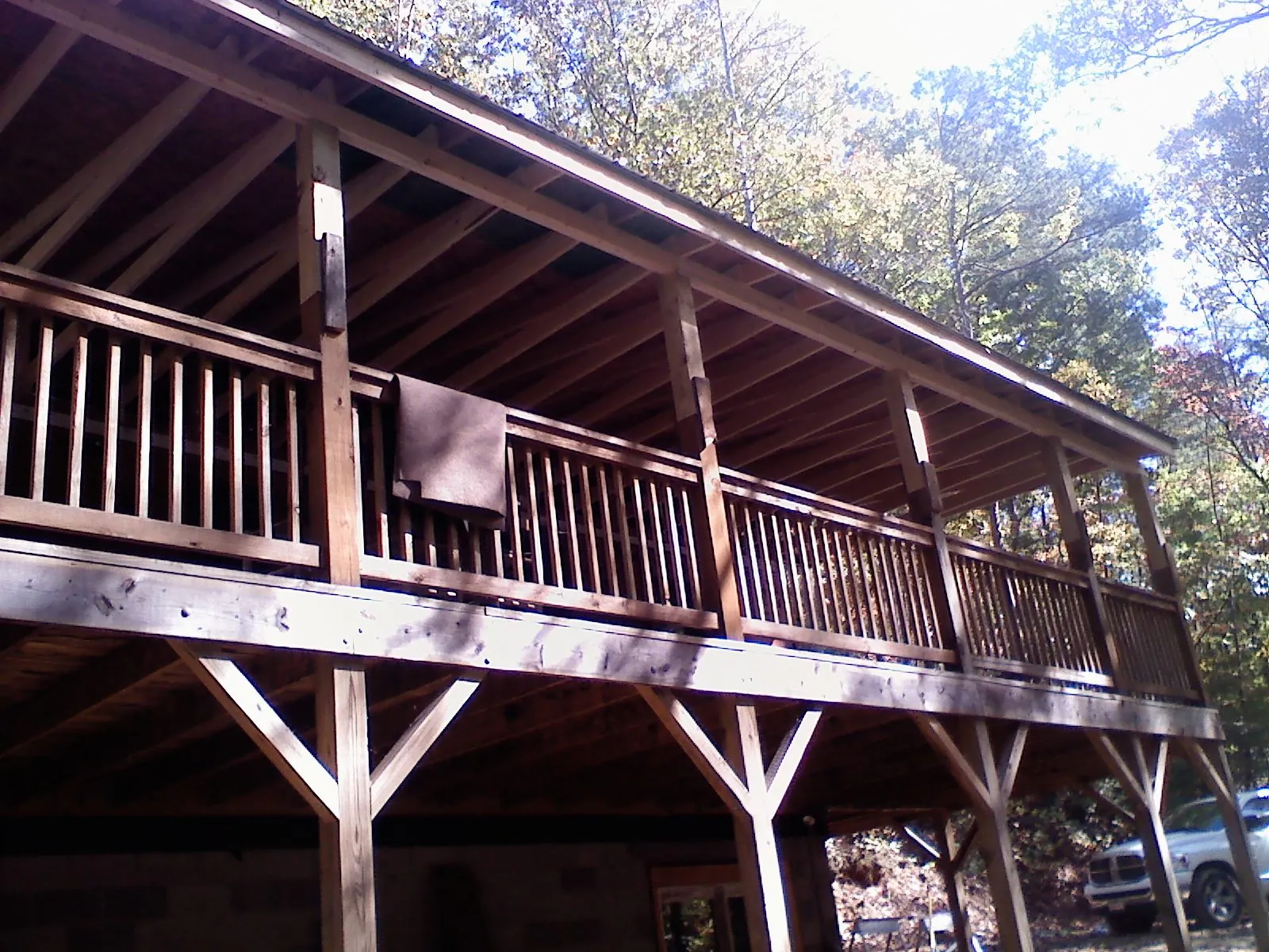 Timber framing under a new elevated porch and deck — Roof Leak Repair in Horse Branch by Roofing Brothers